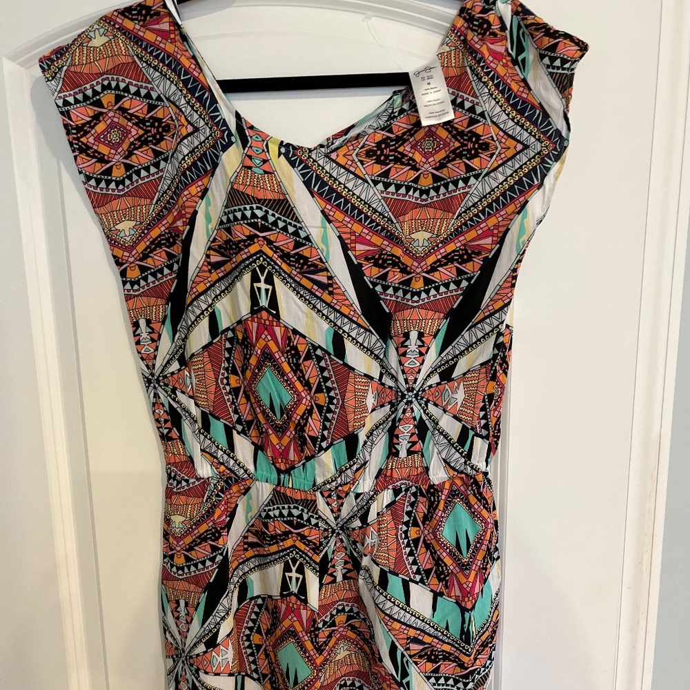 Romper. No. Never worn.